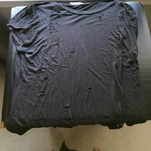 Black shirt with holes in it